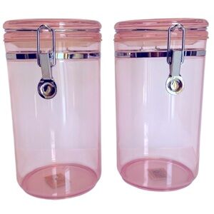 Two Vintage 85 Oz Pink Acrylic Airtight Jar Storage with Silver Clamp Closure.